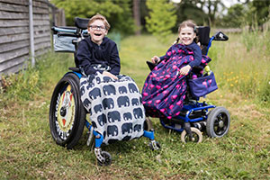 Children in wheelchairs with BundleBean covers