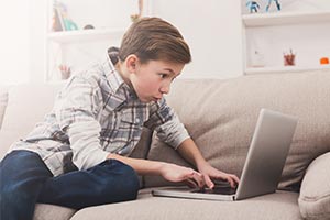 child on laptop using Post-Lockdown Recovery Toolkit