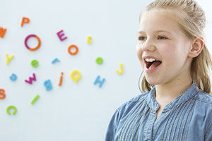 girl in speech therapy